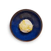 Vanilla pod ice cream with passion fruit sauce